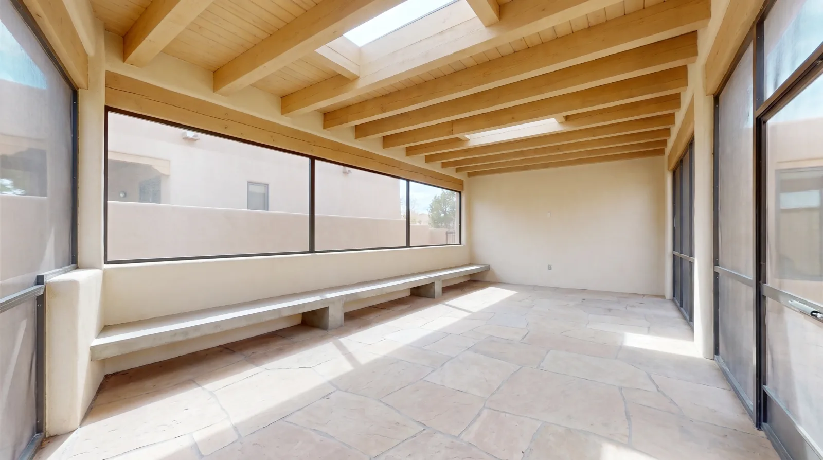 An empty, bright room representing a simple decision-making space for weighing estate sale options